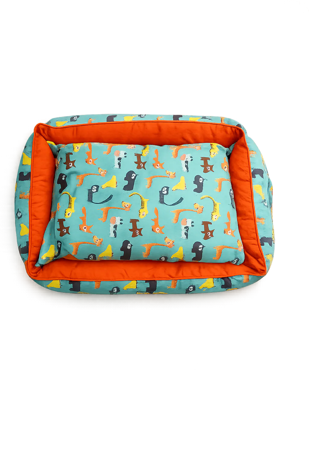 Loom and Latch teal rectangular pet bed with soft, supportive cushioning and animal print design for comfortable everyday use.