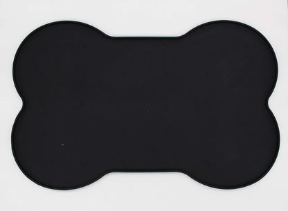 Silicone anti-spill pet feeding mat in waterproof bone shape with non-slip surface by Loom and Latch