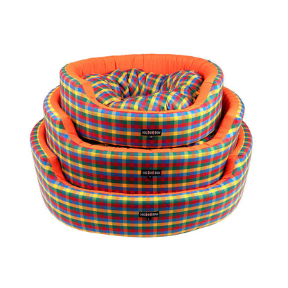Soft round pet bed by Loom and Latch with cushioned comfort and supportive design for cozy pet relaxation.