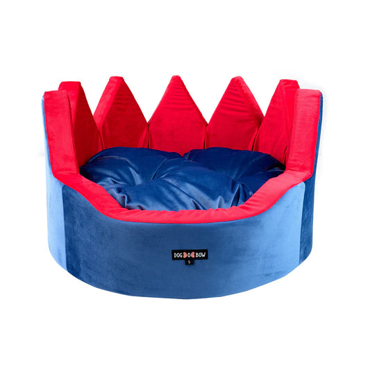 Red and blue velvet pet bed by Loom and Latch with plush cushioning and cozy design for small pets.