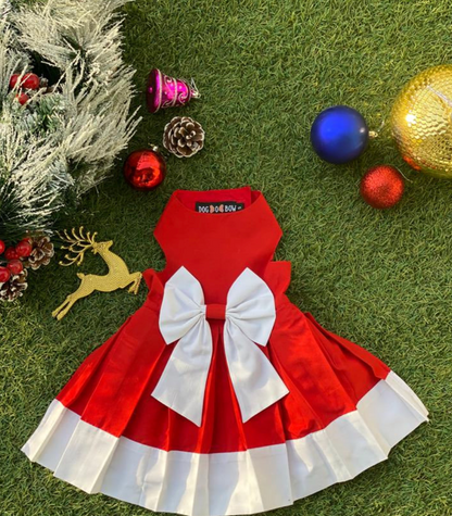 Lightweight festive pet dress by Loom and Latch, featuring colorful holiday patterns for special occasions.